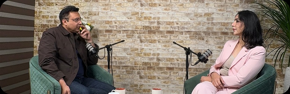 Podcast host and guest seated for an interview